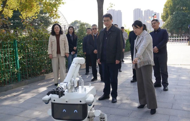 重庆市九龙坡区人大一行到访汽车城考察调研